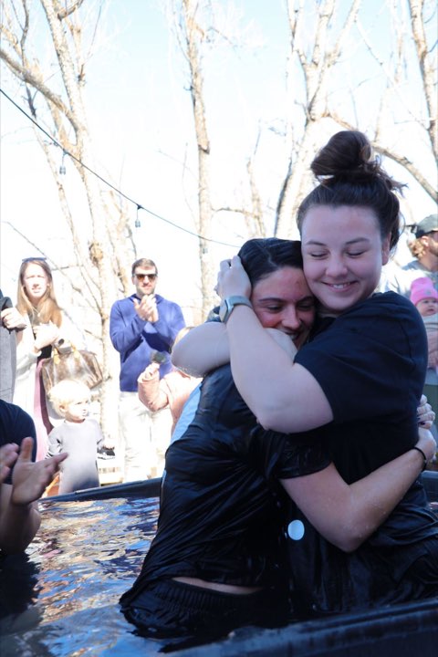 Embrace after a baptism